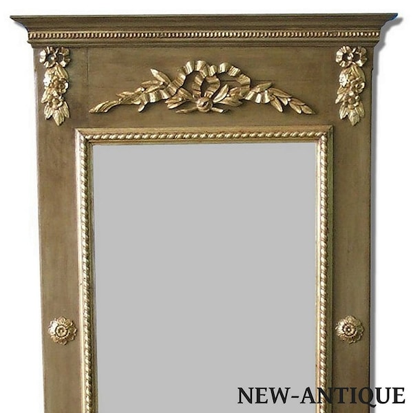 Trumeau Miroir Louis XV avec un décor de nœud. Reproduction a l identique d un trumeau miroir de cheminee.Décoration classique revisitée