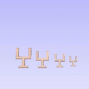 May include: Four wooden football goalposts in different sizes. The goalposts are made of unfinished wood and are perfect for a craft project or decoration.