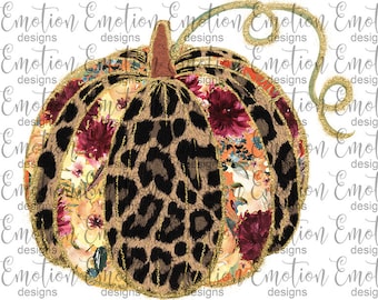 May include: A gold glitter pumpkin with a leopard print and floral pattern. The pumpkin has a stem and a vine.