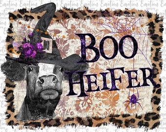 May include: A black and white cow wearing a witch's hat with purple flowers and a spiderweb background. The text "BOO HEIFER" is written in purple glitter letters.