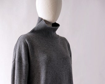 Jersey clásico holgado y acogedor con cuello alto de lana de cachemira y cuello alto