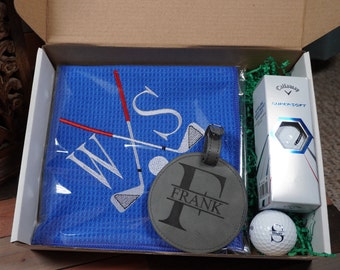 Personalized Golf Gift Box. Include a golf towel, a set of three golf balls with monograms, and a golf bag tag with tee holder