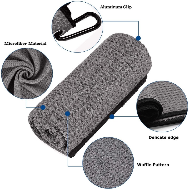 Puede incluir: Una toalla de microfibra gris con un patr&oacute;n de gofre y un borde negro. La toalla tiene un clip de aluminio y un borde delicado.