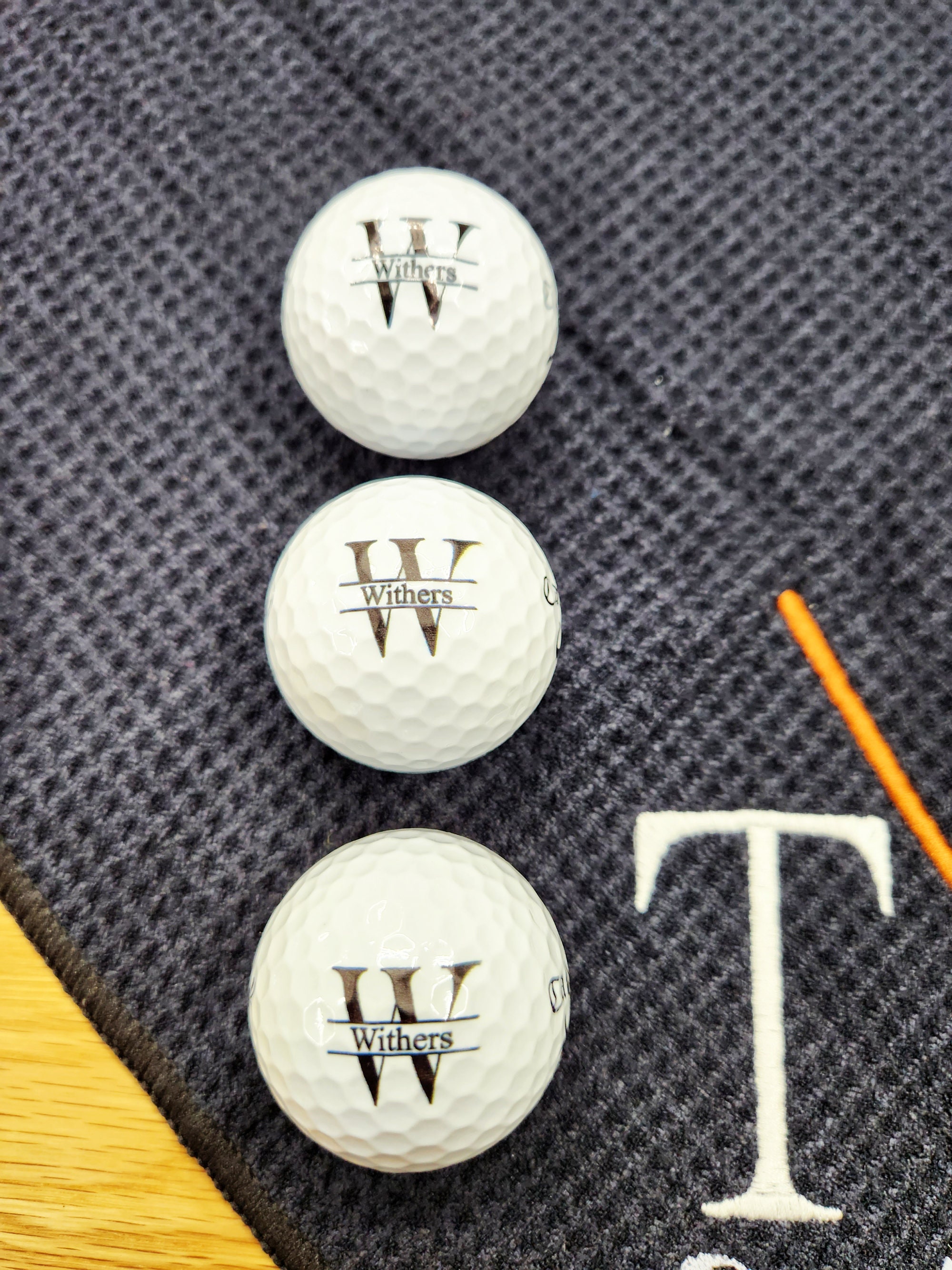 Personalized Golf Gift Box. Include a golf towel, a set of three golf Pro V1 balls with monograms, and a golf bag tag with tee holder