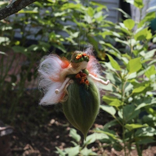 Needle felted autumn green and colorful wool fairy with assorted orange and yellow flowers, Waldorf Inspired fall wool fairy.