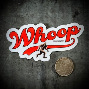 May include: A white sticker with a red and orange graphic of the word "Whoop" with a small illustration of a Bigfoot running. The text "IKNOWSQUATCH®" is below the word "Whoop".