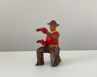 Soldat jouet en plomb agenouillé COWBOY BRITAINS vintage des années 40