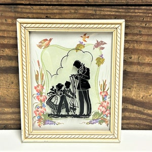 Vintage Framed Glass Silhouette, Children Playing with a Puppet, White Wood Frame, Colored Background, Silhouette Painted On Bubble Glass