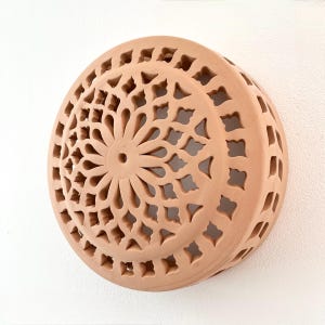 Applique in terracotta