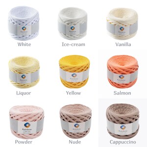 May include: Nine balls of yarn in different colors, including white, ice cream, vanilla, liquor, yellow, salmon, powder, nude, and cappuccino. Each ball is labeled "Rainbow" and has a small circle with a rainbow inside.