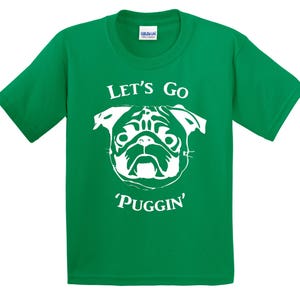 May include: Green t-shirt with a white pug silhouette and the text "Let's Go 'Puggin'".
