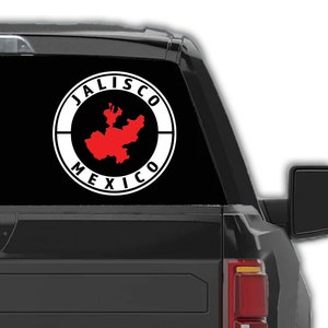 May include: A black truck with a white decal on the back window. The decal is a circle with the words "Jalisco Mexico" and a red outline of the state of Jalisco.