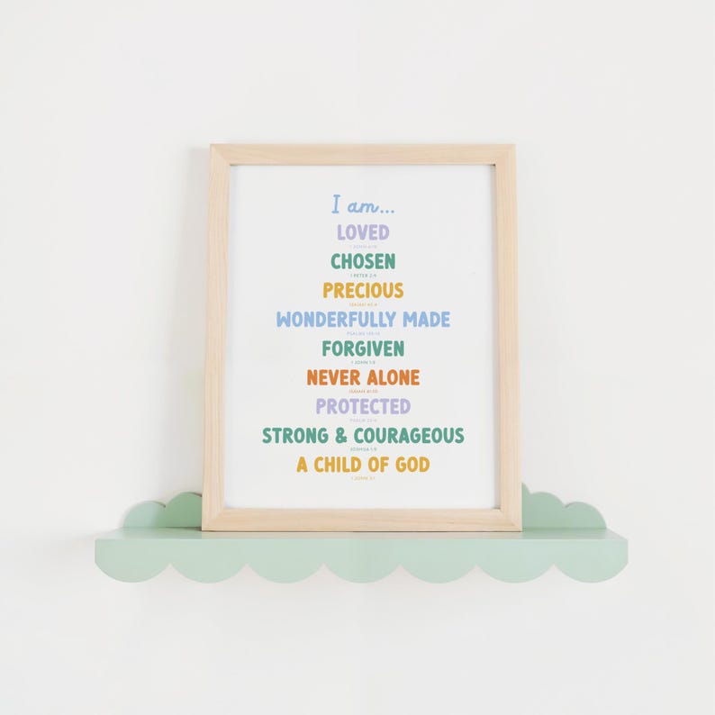 catholic kids bible affirmation printable in a light wood frame on a teal scalloped shelf
