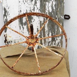ANTIQUE WHEELBARROW WHEEL