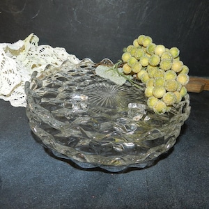 Pair of FOSTORIA FOOTED RISER/7 1/4" diam.