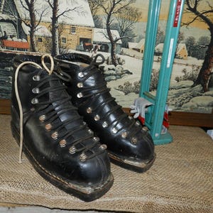 May include: A set of three ceramic mugs with a speckled, matte finish in cream, light grey, and dark grey. Each mug has a simple, minimalist design and a rounded handle.