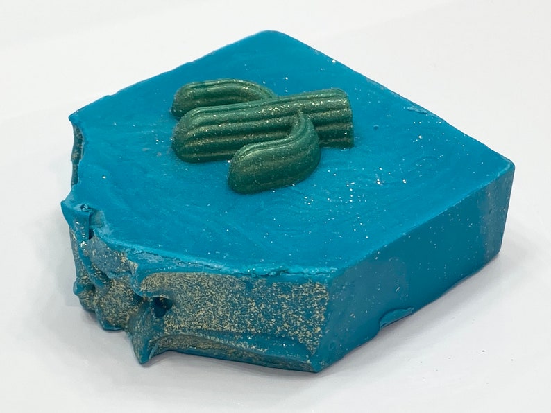 blue soap with cactus on it