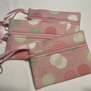 Bubbels op roze portemonnee/cadeaukaarthouder