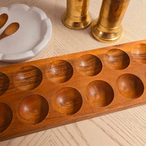 Wooden Egg holder handmade using Acacia wood. Holds 12 eggs