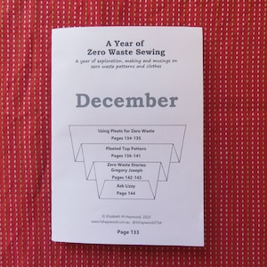 May include: A white page with the text "A Year of Zero Waste Sewing" and "December" in black. The page is divided into sections with the titles "Using Pleats for Zero Waste", "Pleated Top Pattern", "Zero Waste Stories: Gregory Joseph", and "Ask Lizzy". The page also includes page numbers.
