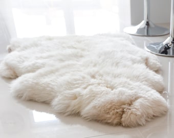 Natural Sheepskin Rug in off White colour. Single sheepskin pelt. Various Sizes