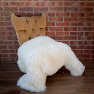 Cream white sheep pelt rug