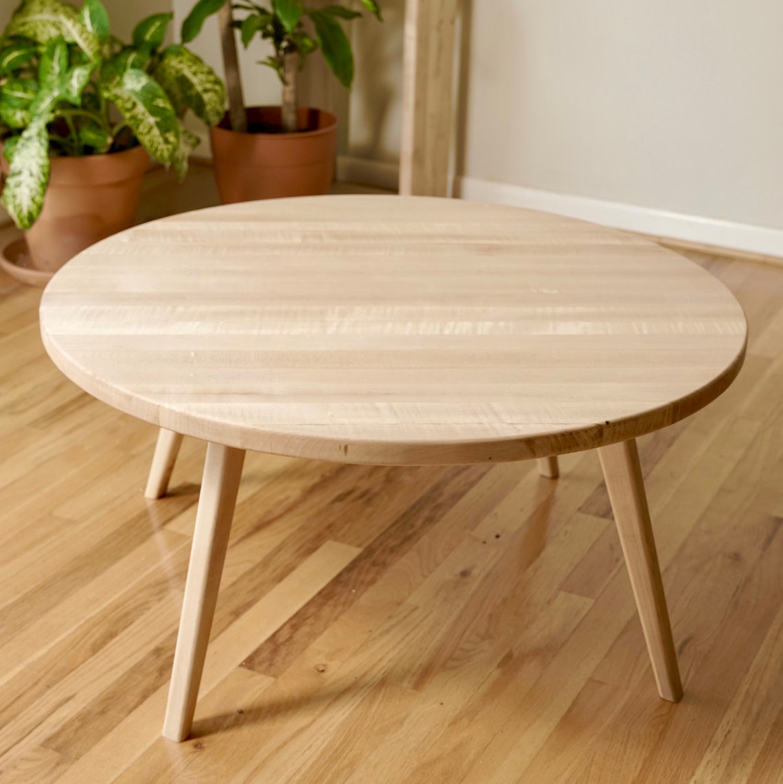 Rounded painted plywood coffee table