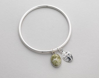 Round Section Bangle with Iona Marble and St. Columba's Pillow Cross Charm - A Sterling Silver Bracelet by Aosdana, Isle of Iona.