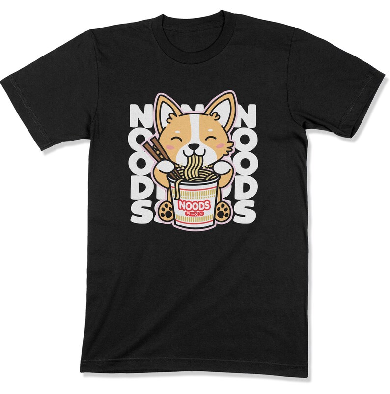 May include: Black t-shirt with a cartoon corgi dog eating ramen noodles from a red and white bowl. The text "NOODS" is printed on the bowl. The text "NOODS" is repeated in a vertical pattern on the shirt.