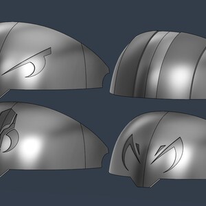 May include: Four silver-colored helmet pieces with different designs. The designs include a skull and crossbones, a stylized eye, and a striped pattern.