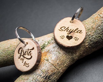 Dog tag made of wood (natural knot disc with bark) with individual engraving incl. back & weather protection