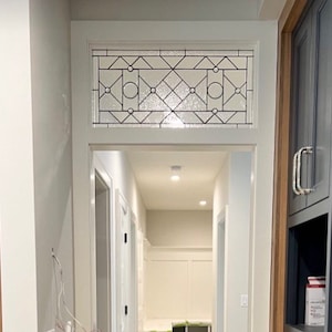 22-04 Custom stained glass transom window in clear textures and beveled glass