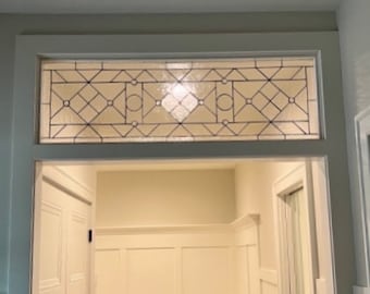 22-06 Custom stained glass transom window in clear textures and beveled glass