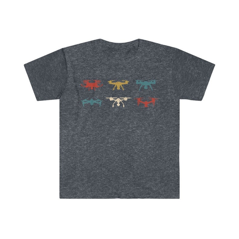 May include: Dark heather gray t-shirt featuring a retro design of six drones in various colors. The drones are arranged in two rows of three, with colors including red, yellow, teal, and white. The shirt has a classic crew neck.