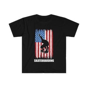 May include: Black t-shirt with a silhouette of a skateboarder in front of an American flag with the text "Skateboarding" underneath.