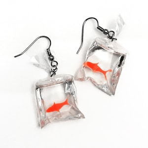 Goldfish in bag earrings deals