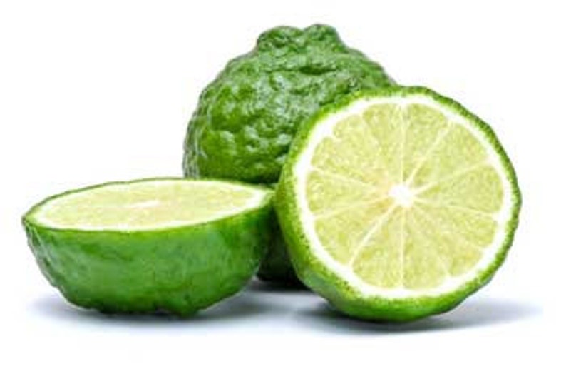 May include: Two whole green bergamot fruits and one halved bergamot fruit, showing the inside flesh and seeds.
