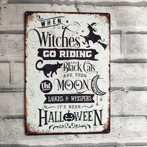 When Witches Go Riding and Black Cats are seen Metal Halloween Sign