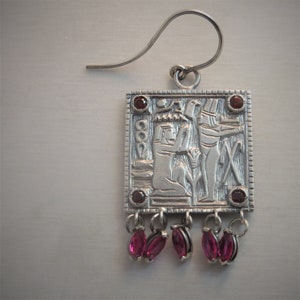 Egyptian Motif silver earrings with rubies and garnets