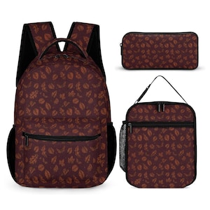 May include: A backpack, a rectangular pencil case, and a lunch bag, all featuring a dark maroon fabric with a repeating pattern of brown autumn leaves. The backpack includes black shoulder straps, side mesh pockets, and a front zippered pocket.