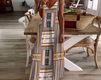 May include: A sleeveless maxi dress with a V-neckline and a colorful geometric pattern. The dress is made of a lightweight fabric and has a flowy silhouette.