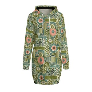 May include: A green hooded dress with a floral pattern in shades of green, blue, and pink. The dress has a drawstring hood and long sleeves.