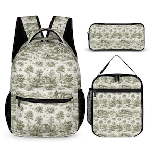 May include: A backpack, a rectangular pencil case, and a lunch bag, all featuring a monochromatic green and white toile de jouy pattern depicting a rural landscape with trees, houses, and small animals, finished with black zippers and side mesh pockets.