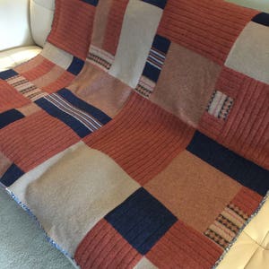 Upcycled wool sweater blanket throw with traditional cotton quilt binding