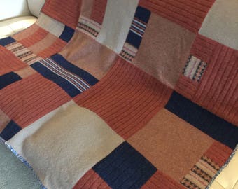 Upcycled wool sweater blanket throw with traditional cotton quilt binding