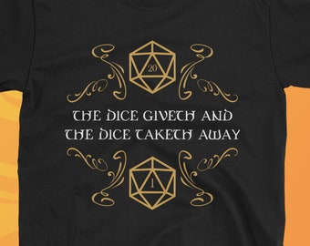 Könnte beinhalten: Schwarzes T-Shirt mit einem goldenen Design mit zwei Würfeln und dem Text "The dice giveth and the dice taketh away".