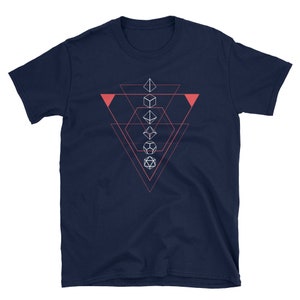 May include: Navy blue t-shirt with a geometric design featuring five white dice in a triangle shape. The triangle is outlined in pink.