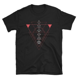 May include: Black t-shirt with a geometric design featuring five white dice in a triangle shape. The triangle is outlined in pink.