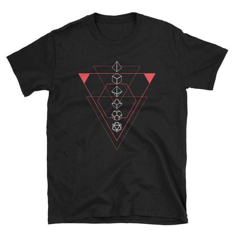 May include: Black t-shirt with a geometric design featuring five white dice in a triangle shape. The triangle is outlined in pink.