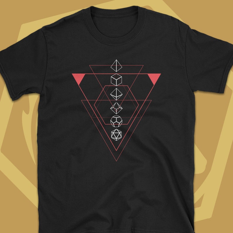May include: Black t-shirt with a geometric design featuring a series of white dice in a triangle shape. The triangle is outlined in pink.